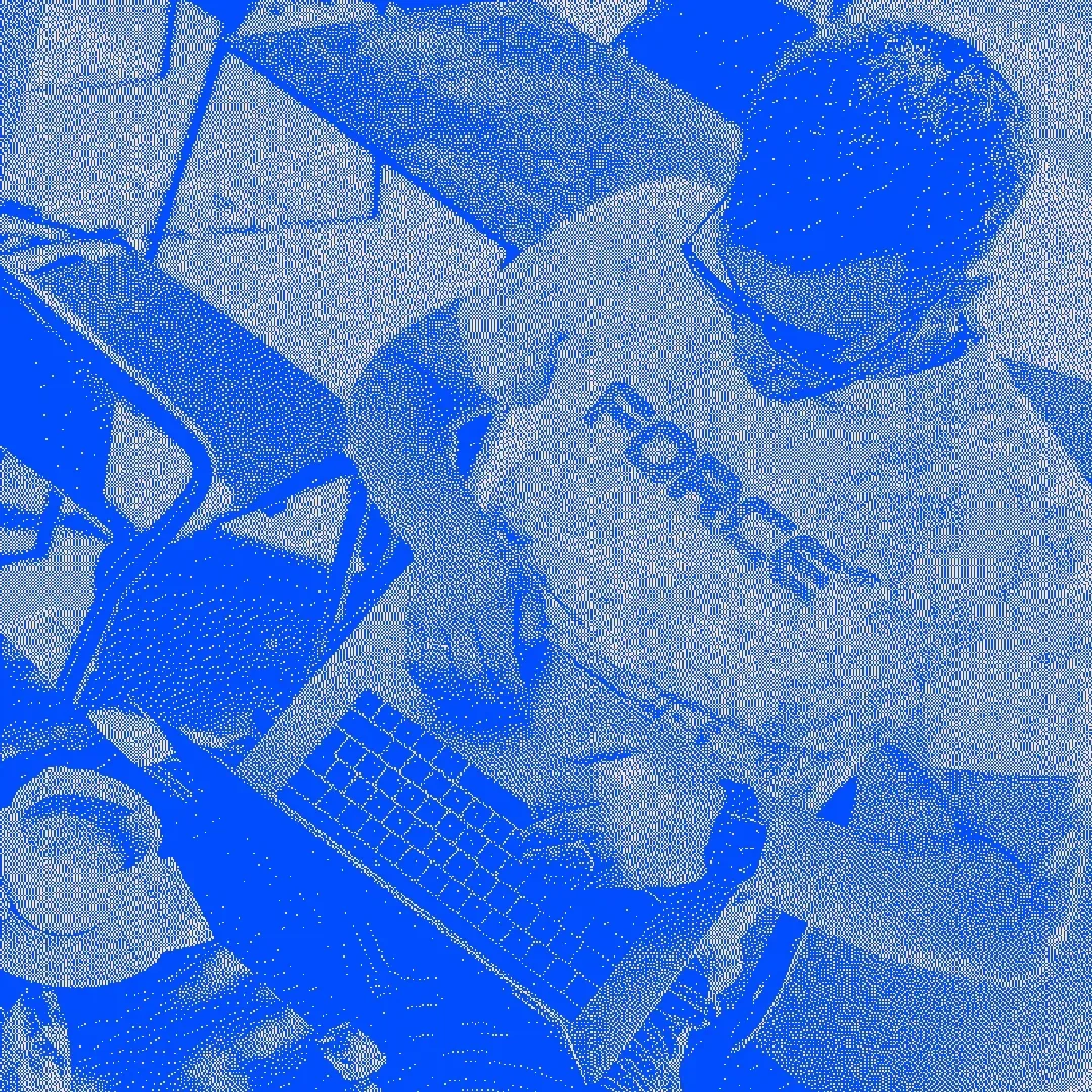 A person working at a desk with a computer